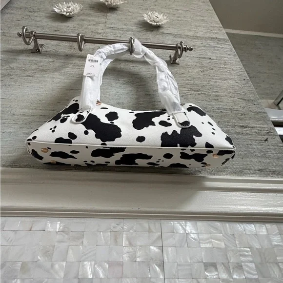 NWT new Anthropologie melie bianco east west shoulder bag cow print black white - Picture 9 of 15